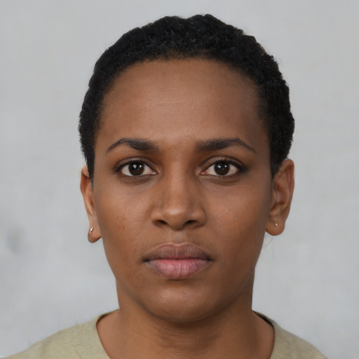 Neutral black young-adult female with short  black hair and brown eyes