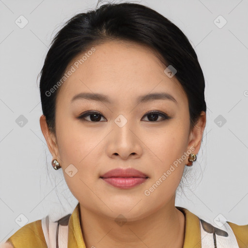 Joyful asian young-adult female with medium  brown hair and brown eyes