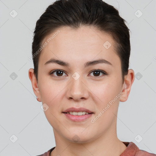 Joyful white young-adult female with short  brown hair and brown eyes