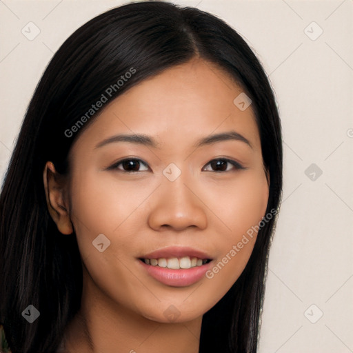 Joyful asian young-adult female with long  black hair and brown eyes