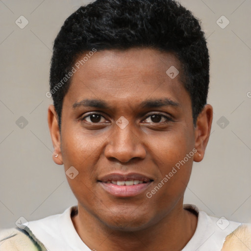 Joyful black young-adult male with short  black hair and brown eyes