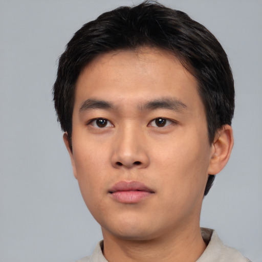 Neutral asian young-adult male with short  black hair and brown eyes