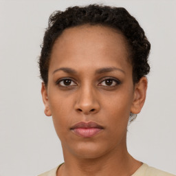 Neutral black young-adult female with short  brown hair and brown eyes