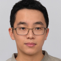 Neutral asian young-adult male with short  brown hair and brown eyes