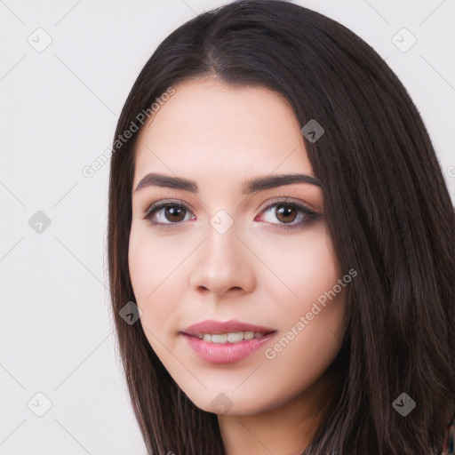 Joyful white young-adult female with long  black hair and brown eyes