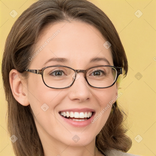 Joyful white young-adult female with medium  brown hair and green eyes