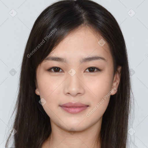 Joyful asian young-adult female with long  brown hair and brown eyes