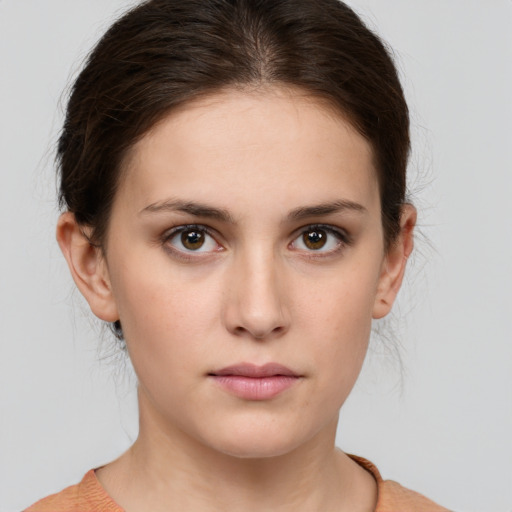 Neutral white young-adult female with medium  brown hair and brown eyes