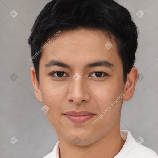 Joyful asian young-adult male with short  black hair and brown eyes