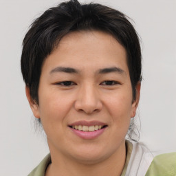 Joyful asian young-adult female with short  brown hair and brown eyes