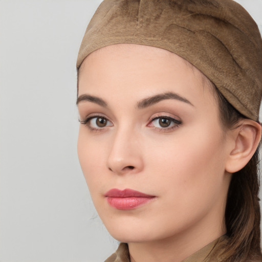 Neutral white young-adult female with long  brown hair and brown eyes