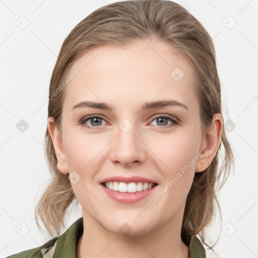 Joyful white young-adult female with medium  brown hair and grey eyes