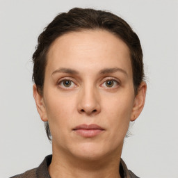 Neutral white young-adult female with short  brown hair and grey eyes