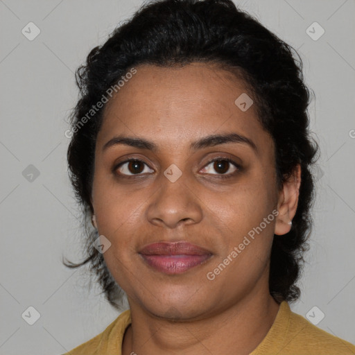 Joyful black young-adult female with medium  black hair and brown eyes