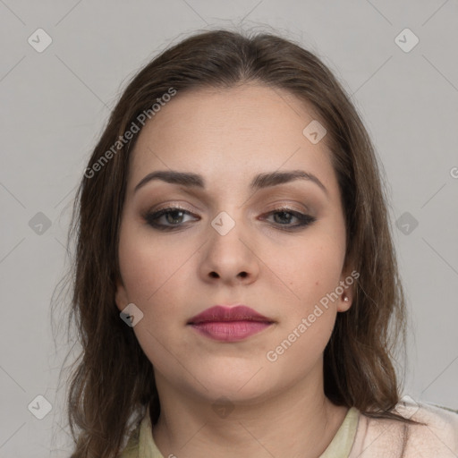 Neutral white young-adult female with medium  brown hair and brown eyes