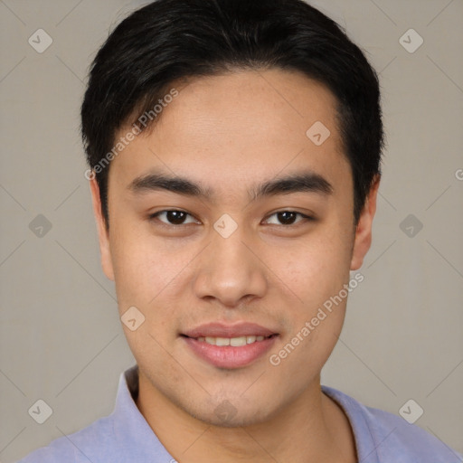 Joyful white young-adult male with short  black hair and brown eyes