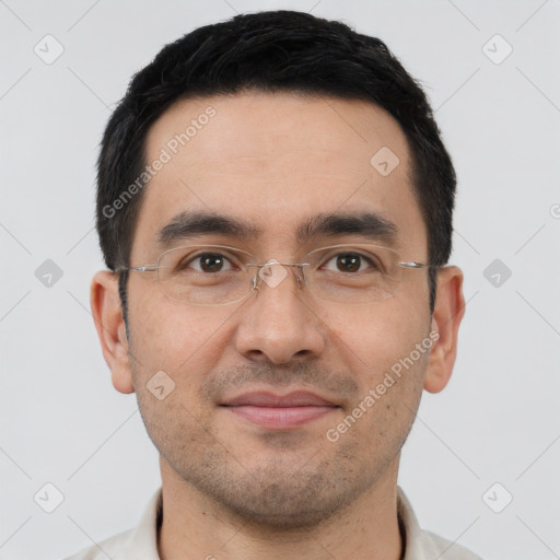 Joyful white young-adult male with short  black hair and brown eyes