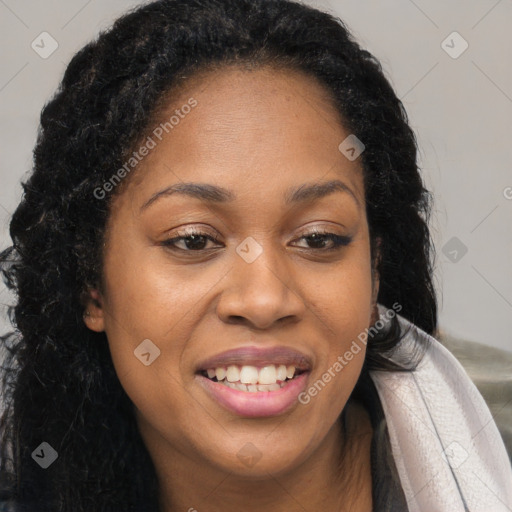 Joyful black young-adult female with long  brown hair and brown eyes