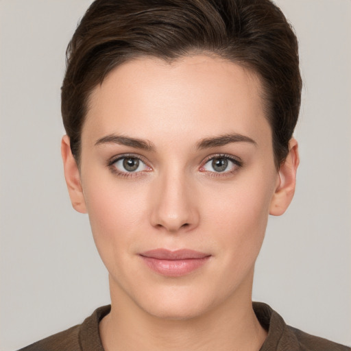 Neutral white young-adult female with short  brown hair and brown eyes