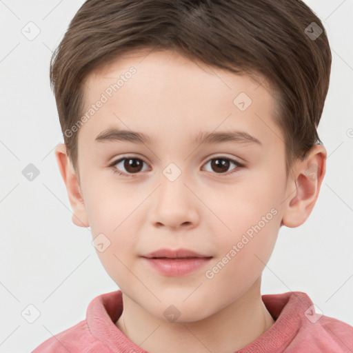 Joyful white child male with short  brown hair and brown eyes