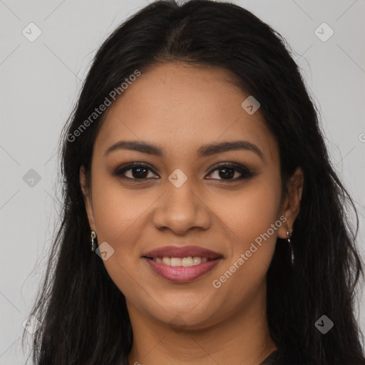 Joyful latino young-adult female with long  brown hair and brown eyes