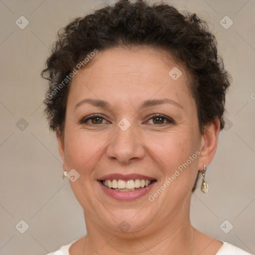 Joyful white adult female with short  brown hair and brown eyes