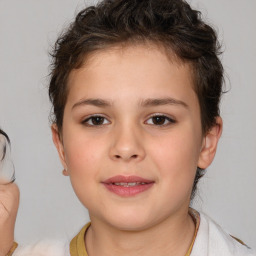 Joyful white child female with short  brown hair and brown eyes