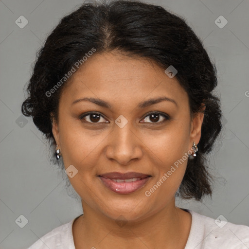 Joyful black adult female with medium  brown hair and brown eyes