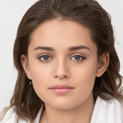 Neutral white young-adult female with medium  brown hair and brown eyes