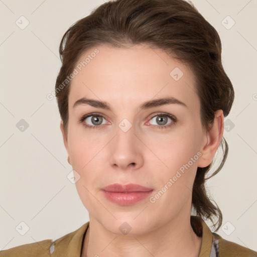 Neutral white young-adult female with medium  brown hair and grey eyes