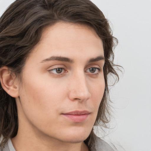 Neutral white young-adult female with medium  brown hair and grey eyes