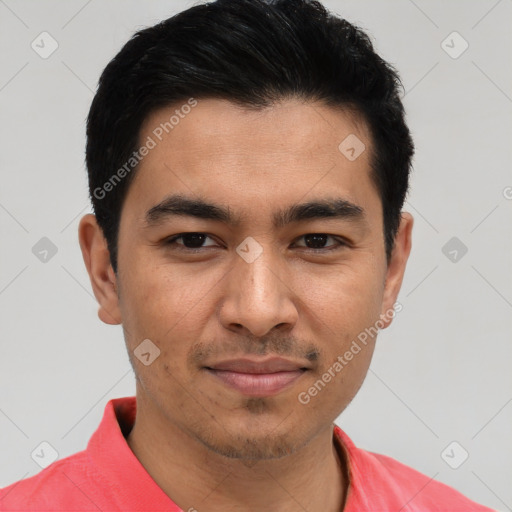 Joyful asian young-adult male with short  black hair and brown eyes