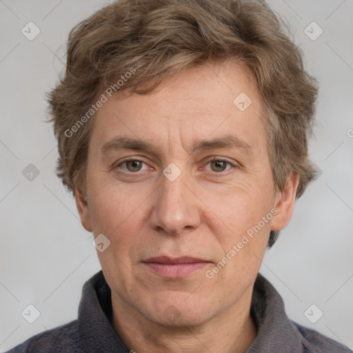 Joyful white adult male with short  brown hair and grey eyes