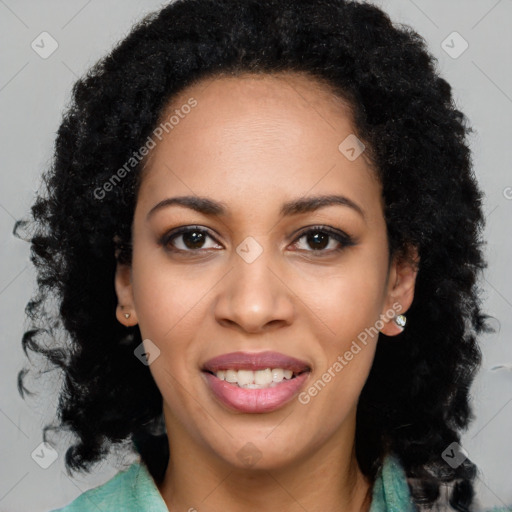 Joyful black young-adult female with long  black hair and brown eyes