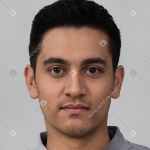 Neutral white young-adult male with short  black hair and brown eyes