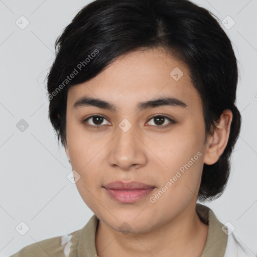 Joyful latino young-adult female with medium  brown hair and brown eyes