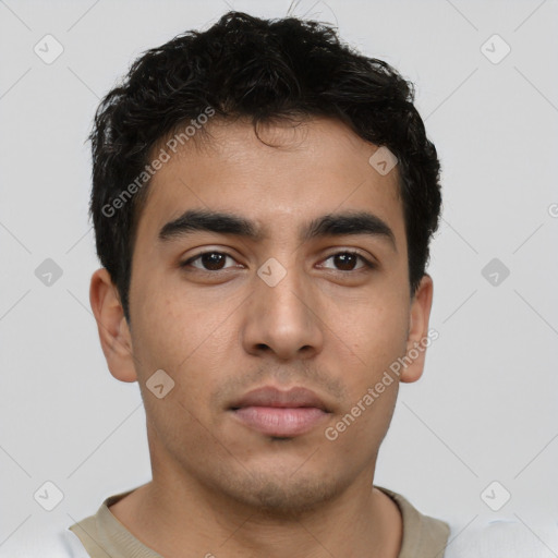 Neutral latino young-adult male with short  brown hair and brown eyes