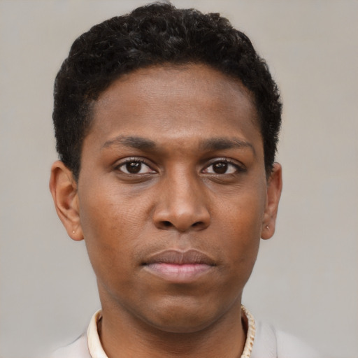 Neutral black young-adult male with short  brown hair and brown eyes