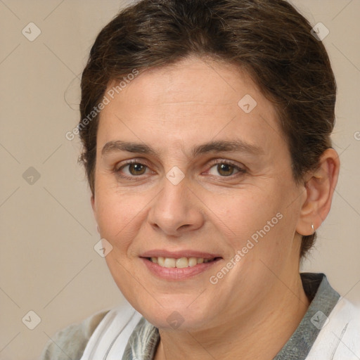 Joyful white adult female with medium  brown hair and brown eyes