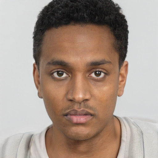 Neutral black young-adult male with short  black hair and brown eyes