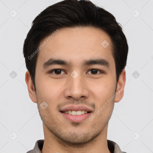 Joyful asian young-adult male with short  brown hair and brown eyes