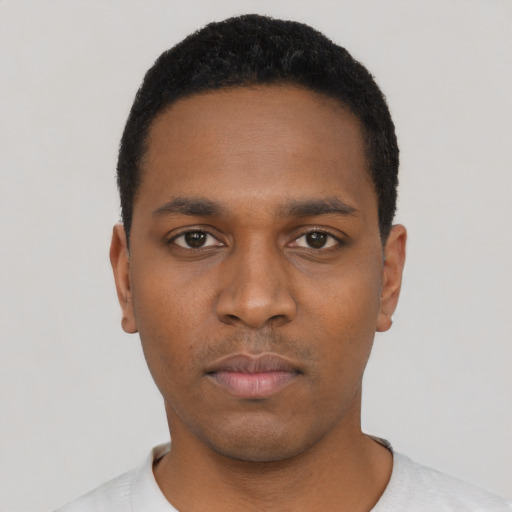 Neutral black young-adult male with short  black hair and brown eyes
