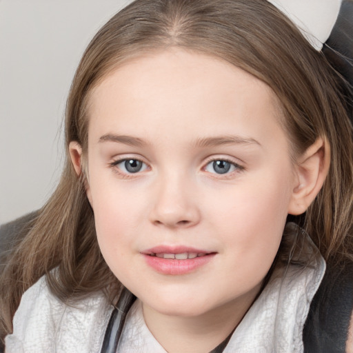 Joyful white child female with medium  brown hair and grey eyes