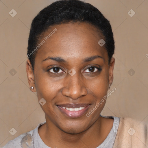 Joyful black young-adult female with short  black hair and brown eyes