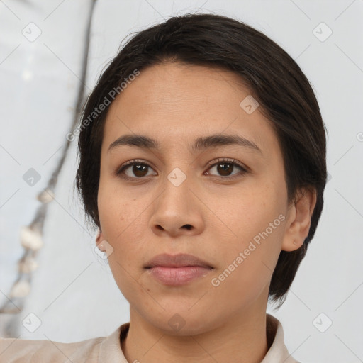 Neutral white young-adult female with short  brown hair and brown eyes