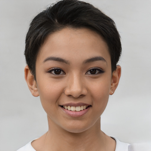 Joyful white young-adult female with short  brown hair and brown eyes