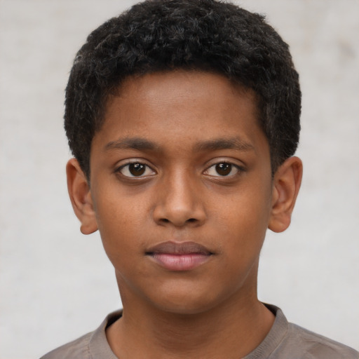 Neutral black child male with short  black hair and brown eyes