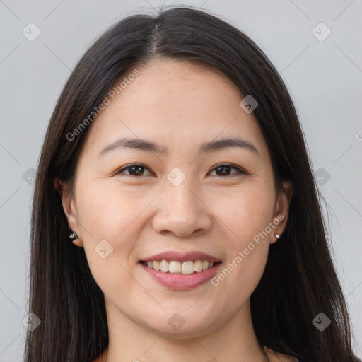 Joyful white young-adult female with long  brown hair and brown eyes