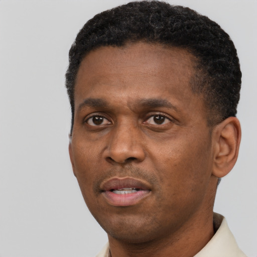 Neutral black adult male with short  black hair and brown eyes