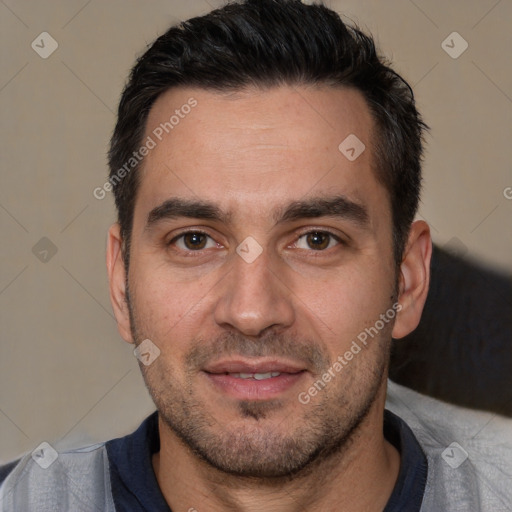 Joyful white adult male with short  brown hair and brown eyes